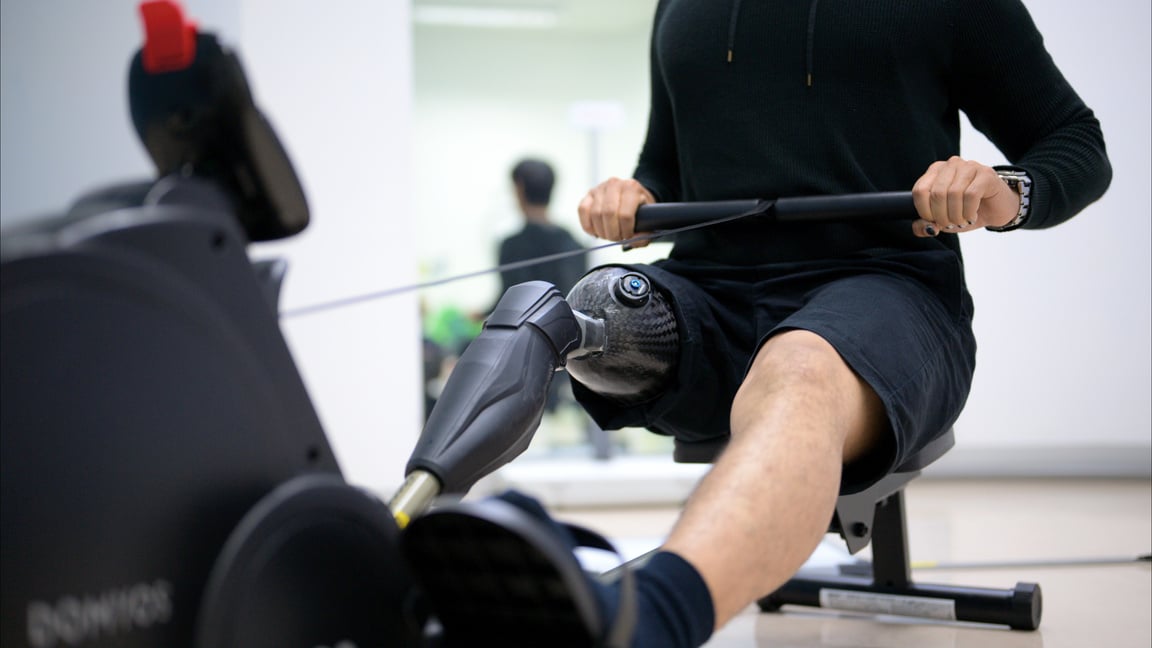 Disabled athlete with physical disability doing exercise routine