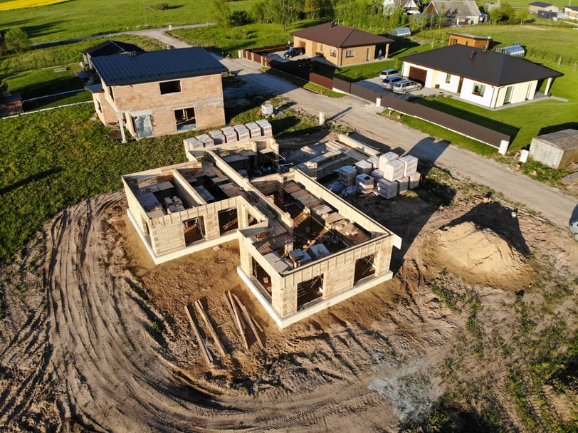 House under construction in construction site